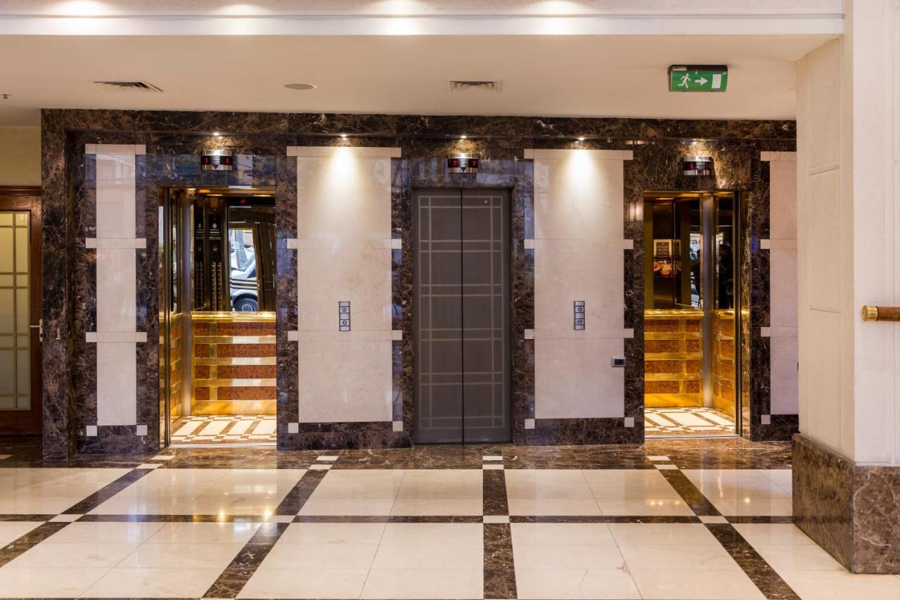 Plaza El Bosque Ebro Hotel Santiago Kültér fotó Elevators at the hotel